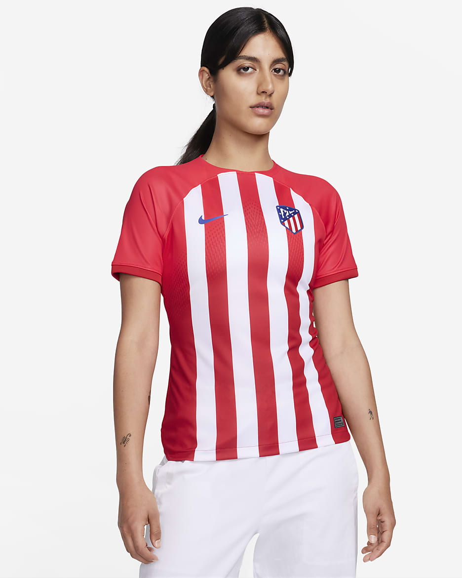 Jersey de fútbol Nike Dri-FIT del Club Atlético de Madrid local 2023/24 Stadium para mujer - Rojo deportivo/Rojo mundial/Blanco/Azul eléctrico