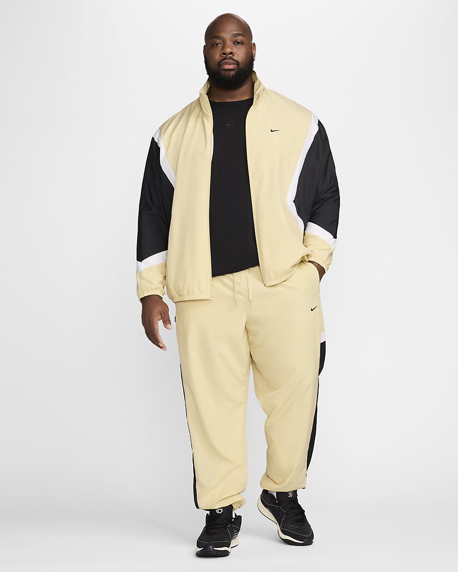 Pantaloni in tessuto da basket Nike Icon – Uomo - Team Gold/Nero/Bianco/Nero