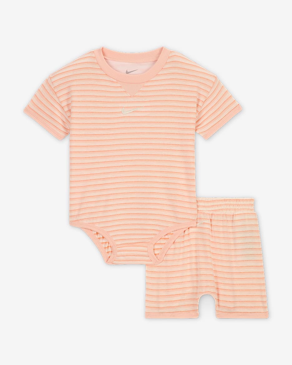 Conjunto de body y shorts Nike ReadySet para bebé (0-9 M) - Coral lavado