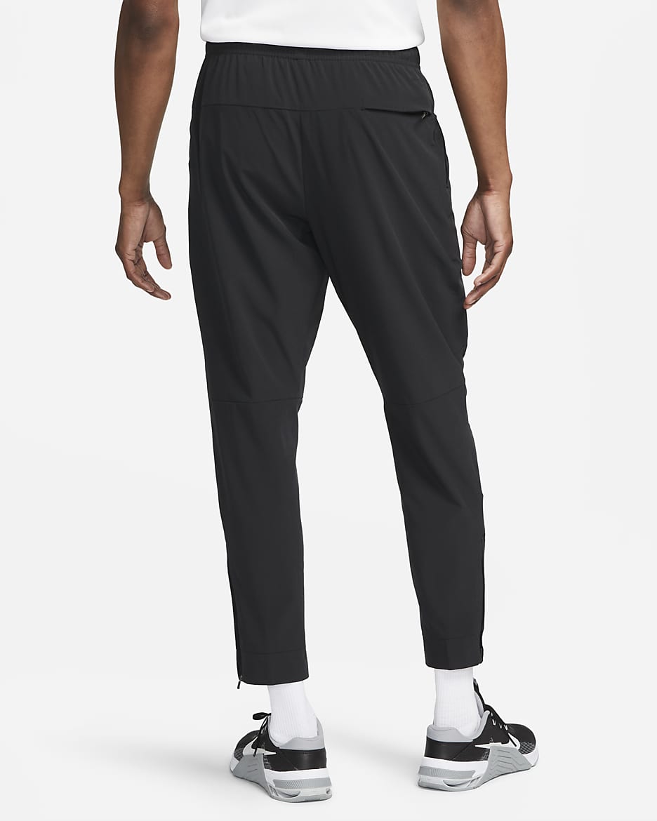 Nike Unlimited Men's Dri-FIT Zip Cuff Versatile Trousers - Black/Black/Black