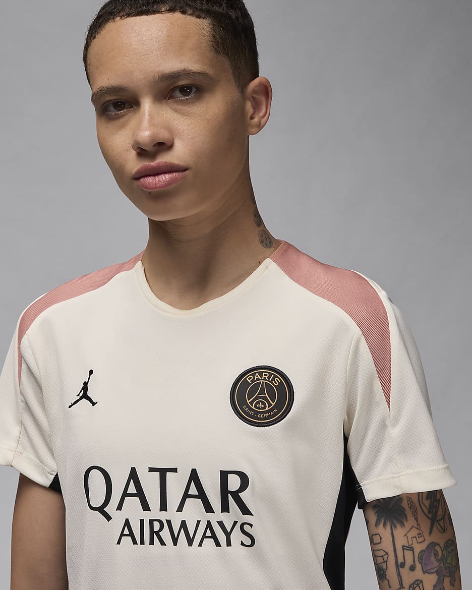 Damska koszulka piłkarska z krótkim rękawem Jordan Dri-FIT Paris Saint-Germain Strike (wersja trzecia) - Pale Ivory/Czerń/Rust Pink/Czerń