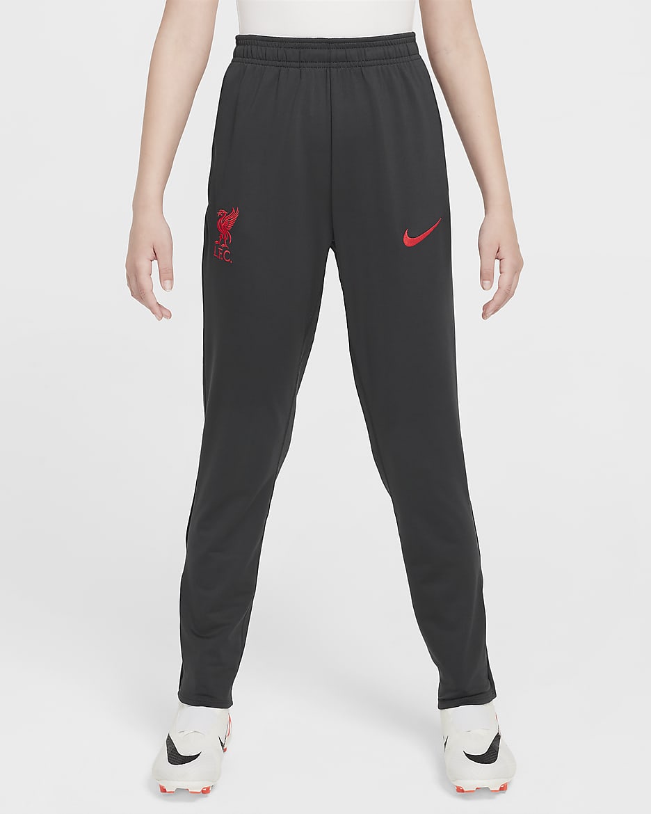 Pantaloni da calcio Nike Dri-FIT Liverpool FC Strike per ragazzo/a – Terza - Dark Smoke Grey/Chrome Yellow/Global Red