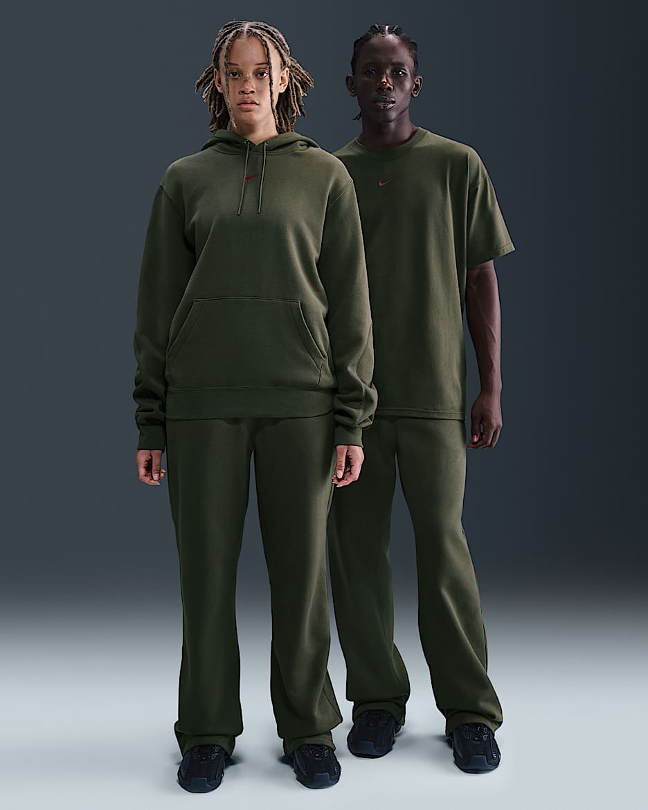 Spodnie dresowe o luźnym kroju u dołu Fleece CS NOCTA - Cargo Khaki/Cargo Khaki/Team Red