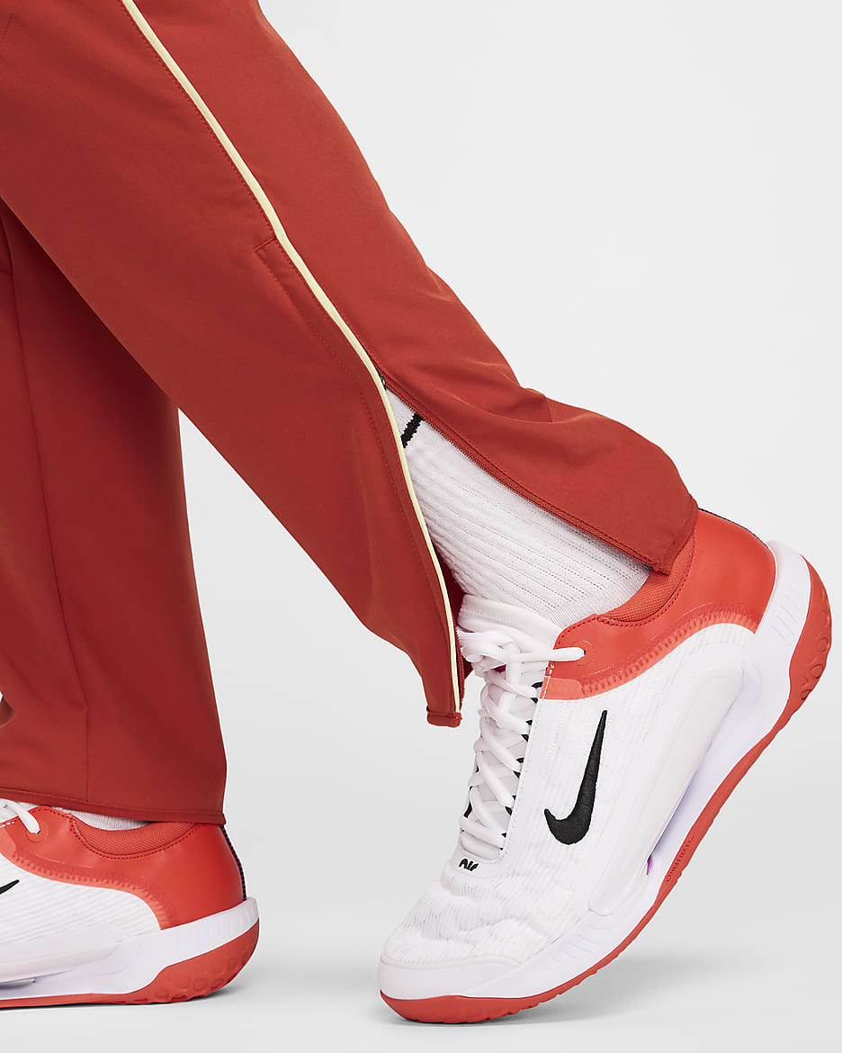 NikeCourt Advantage Pantalón de tenis Dri-FIT - Hombre - Dragon Red/Life Lime/Blanco