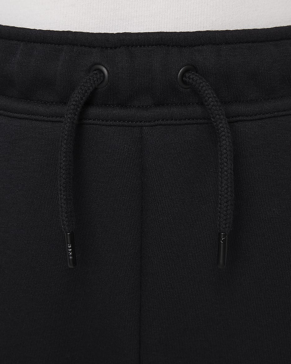 Liverpool FC Tech Fleece Nike-fodboldbukser til større børn (drenge) - sort/sort/Gym Red