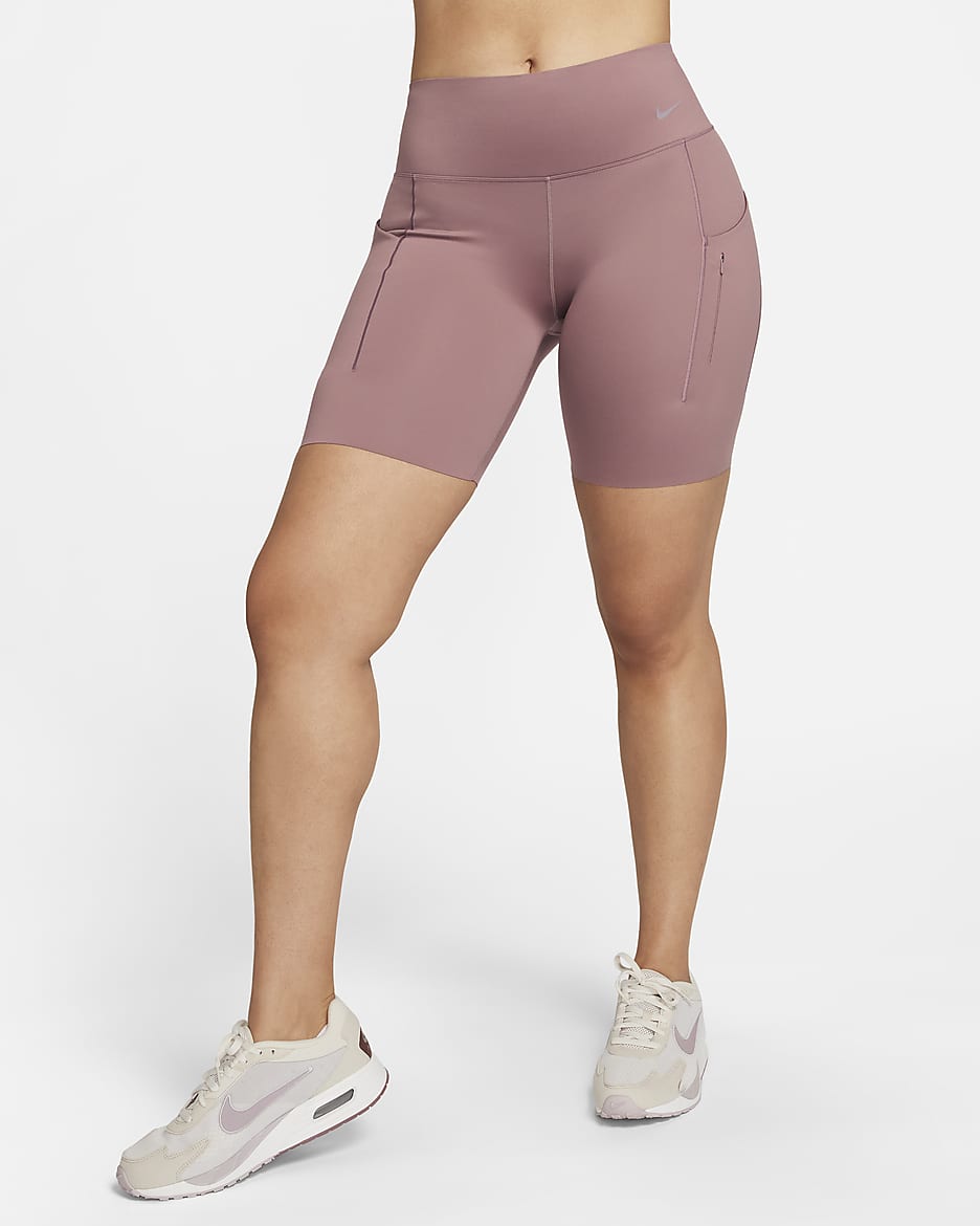 Nike Go-bikershorts (20 cm) med kraftig støtte, mellemhøj talje og lommer til kvinder - Smokey Mauve/sort