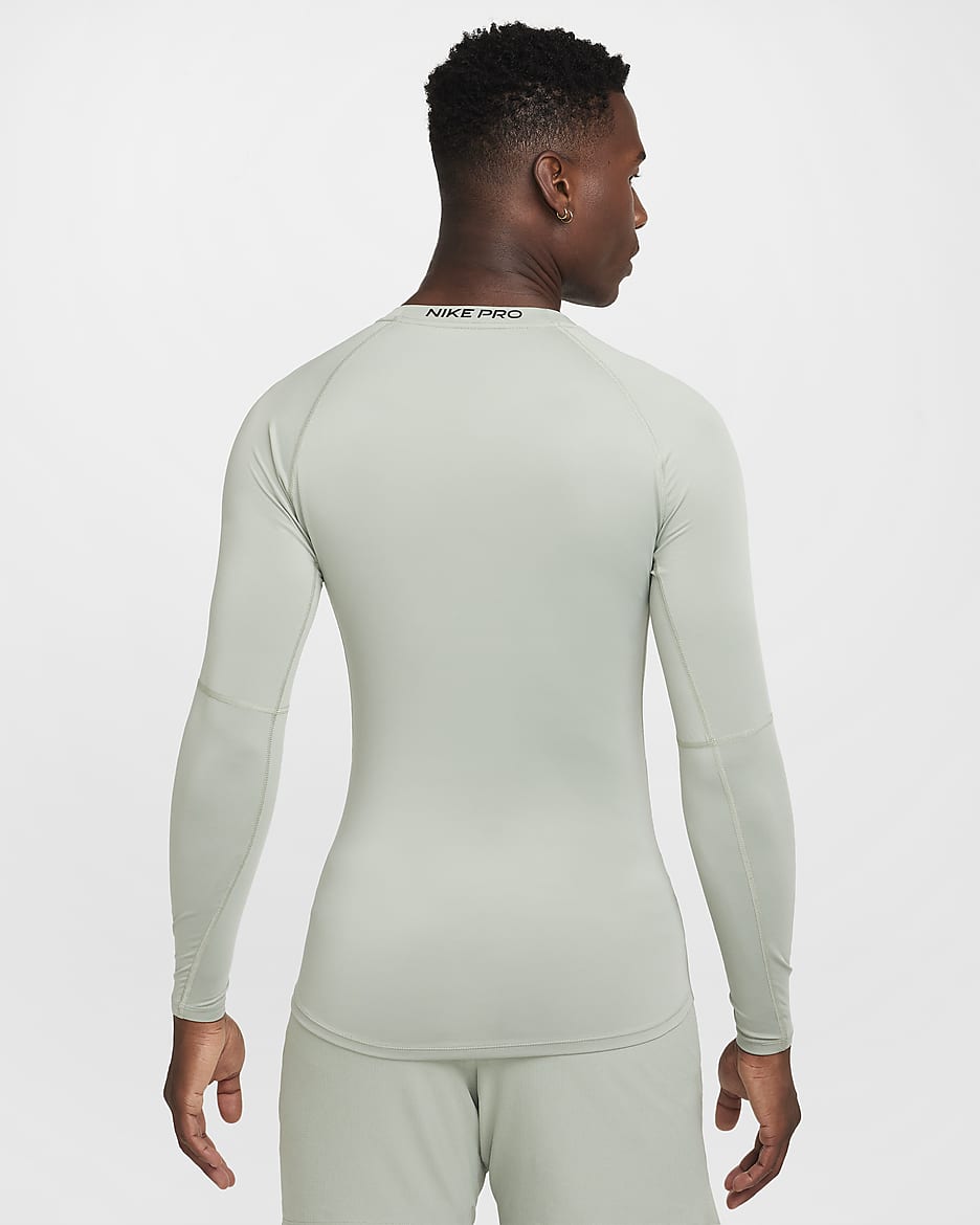 Męska przylegająca koszulka z długim rękawem do fitnessu Dri-FIT Nike Pro - Jade Horizon/Czerń