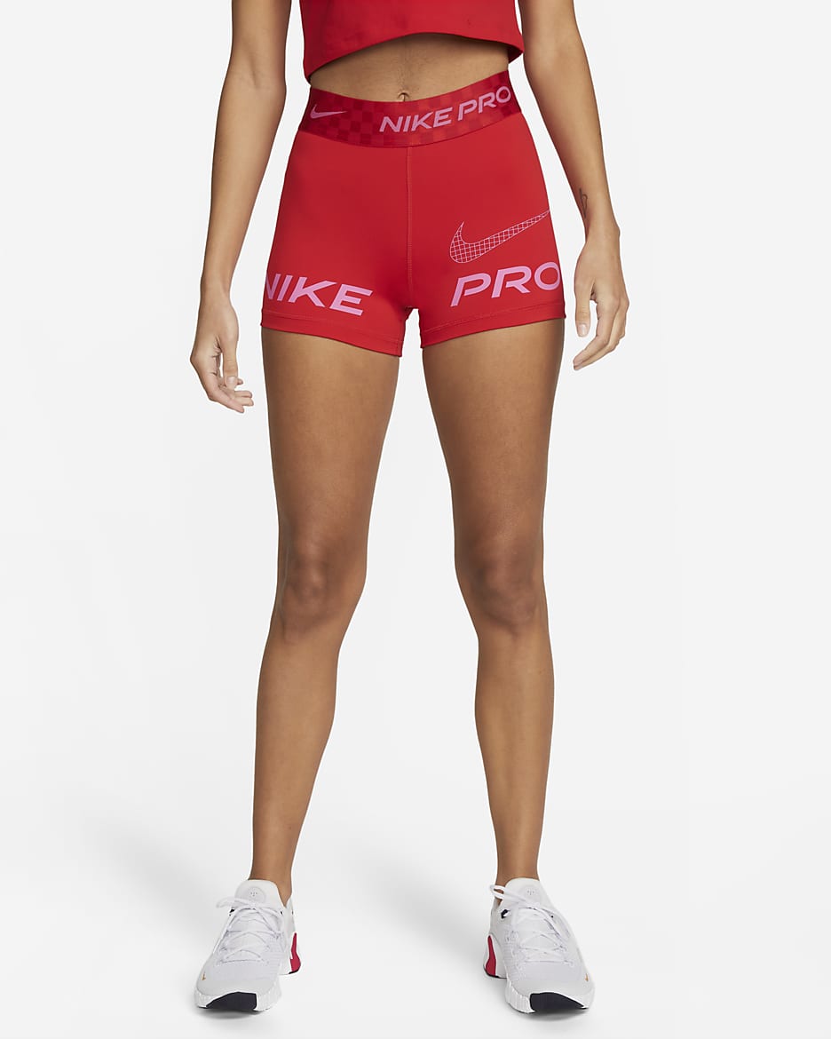 Shorts de entrenamiento de 8 cm y tiro medio estampados para mujer Nike Pro Dri-FIT - Rojo universitario/Rojo gimnasio/Rosa paleta