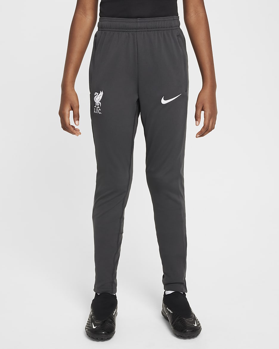Liverpool FC Academy Pro Nike Dri-FIT kötött futballnadrág nagyobb gyerekeknek - Anthracite/Fehér
