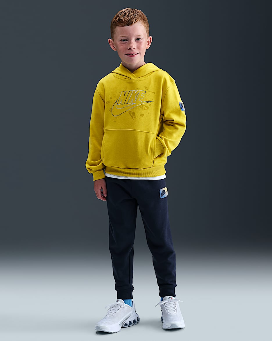 Nike Sportswear Conjunto de dos piezas Reveal con pantalón de tejido French terry - Niño/a pequeño/a - Midnight Navy