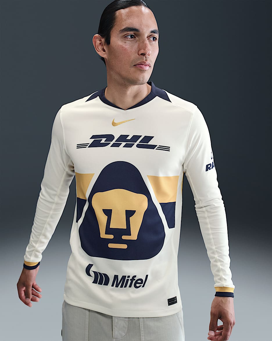 Jersey de fútbol de manga larga Nike Dri-FIT Replica de los Pumas UNAM local 2025/26 Stadium para hombre - Vela/Oro club