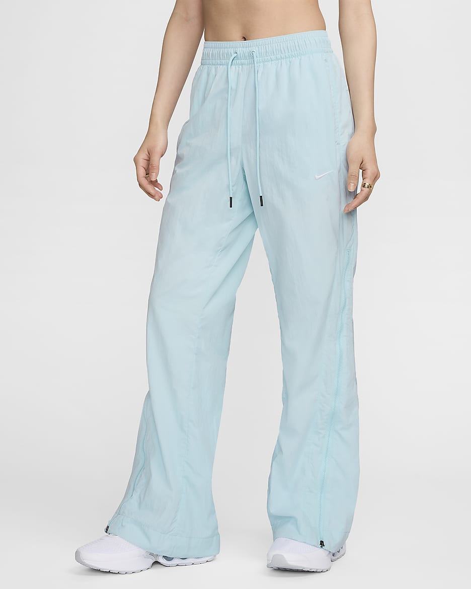 Pantalon à zip taille mi-haute déperlant Nike Sportswear Collection pour femme - Glacier Blue/Blanc