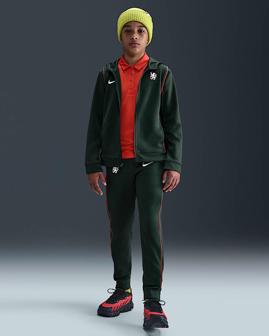Dres piłkarski z tkaniny dla dużych dzieci Nike Chelsea F.C. - Outdoor Green/Speed Red/Phantom