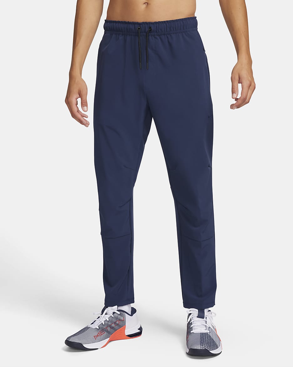 Nike Unlimited Men's Dri-FIT Tapered Leg Versatile Pants - Obsidian/Black/Obsidian