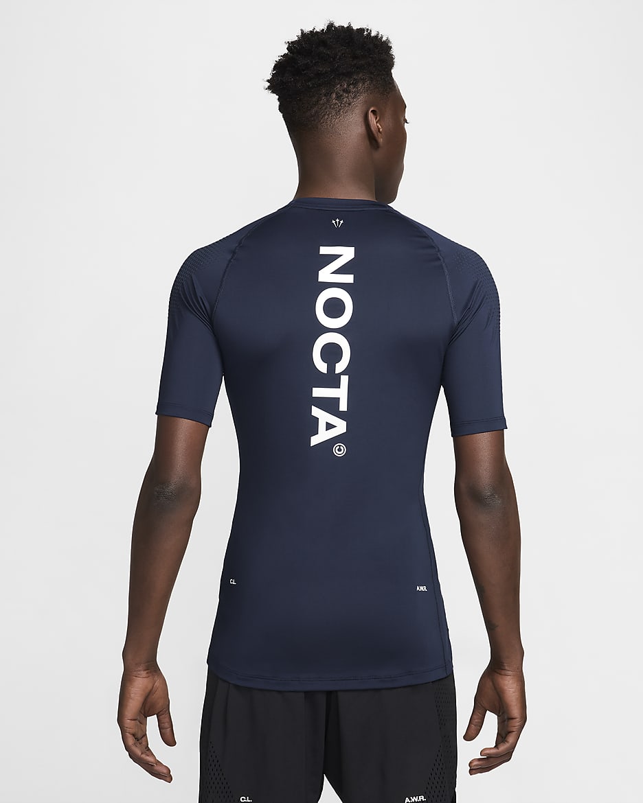 Haut de basketball première couche à manches courtes NOCTA pour Homme - College Navy/Blanc