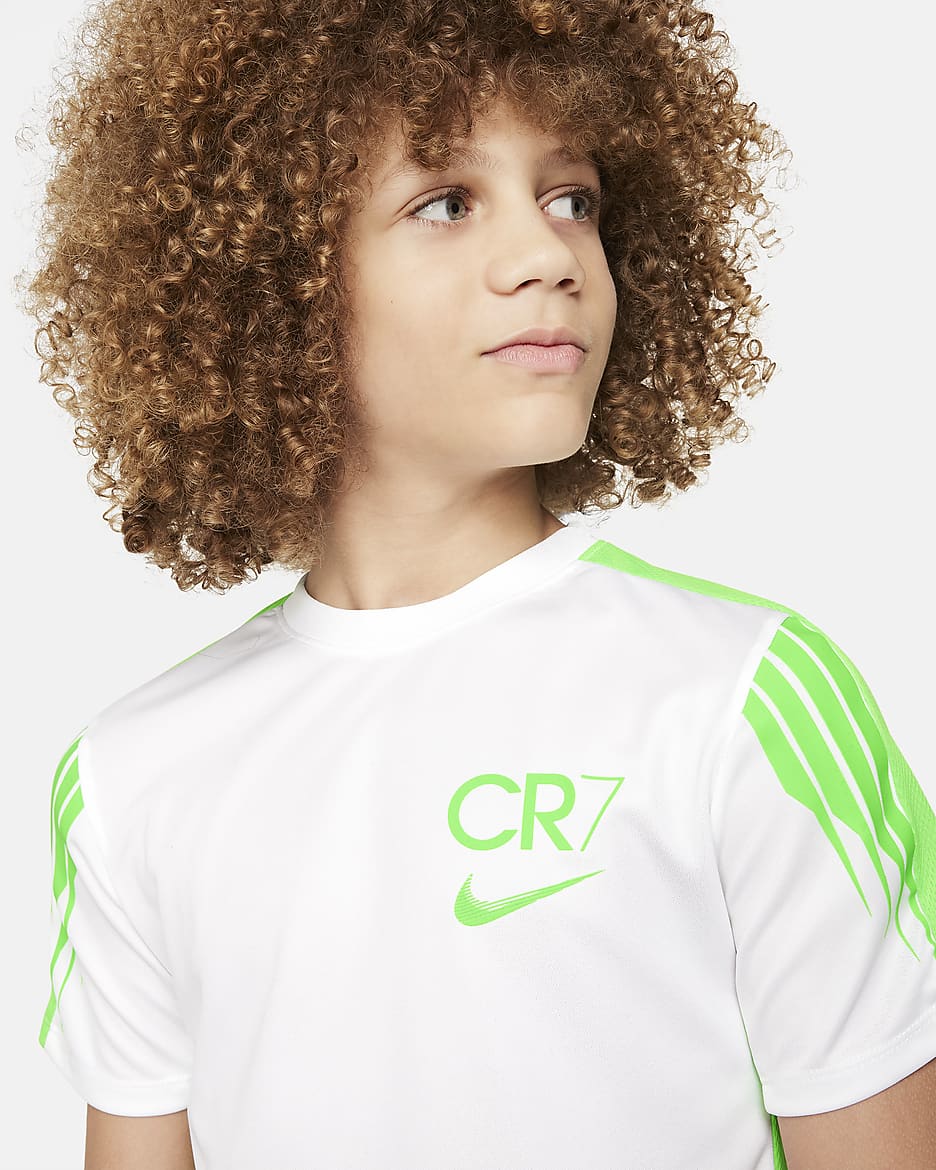 CR7 Dri-FIT Academy23 Fußballoberteil für ältere Kinder - Weiß/Green Strike/Green Strike