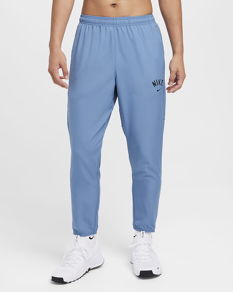 กางเกงวิ่งขายาวผู้ชายแบบทอ Dri-FIT Nike Challenger - Aegean Storm/ดำ