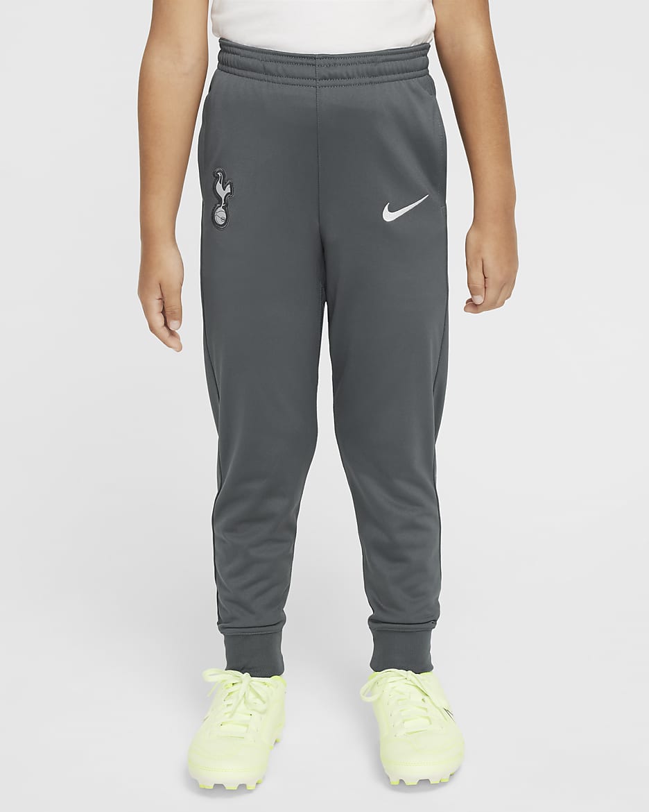 Pleteninová fotbalová sportovní souprava Tottenham Hotspur Strike Nike Dri-FIT pro malé děti - Grey Fog/Polar/Dark Grey/Dark Grey