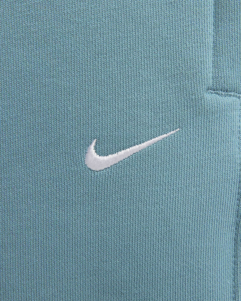 Nike Solo Swoosh Fleecebroek voor dames - Noise Aqua