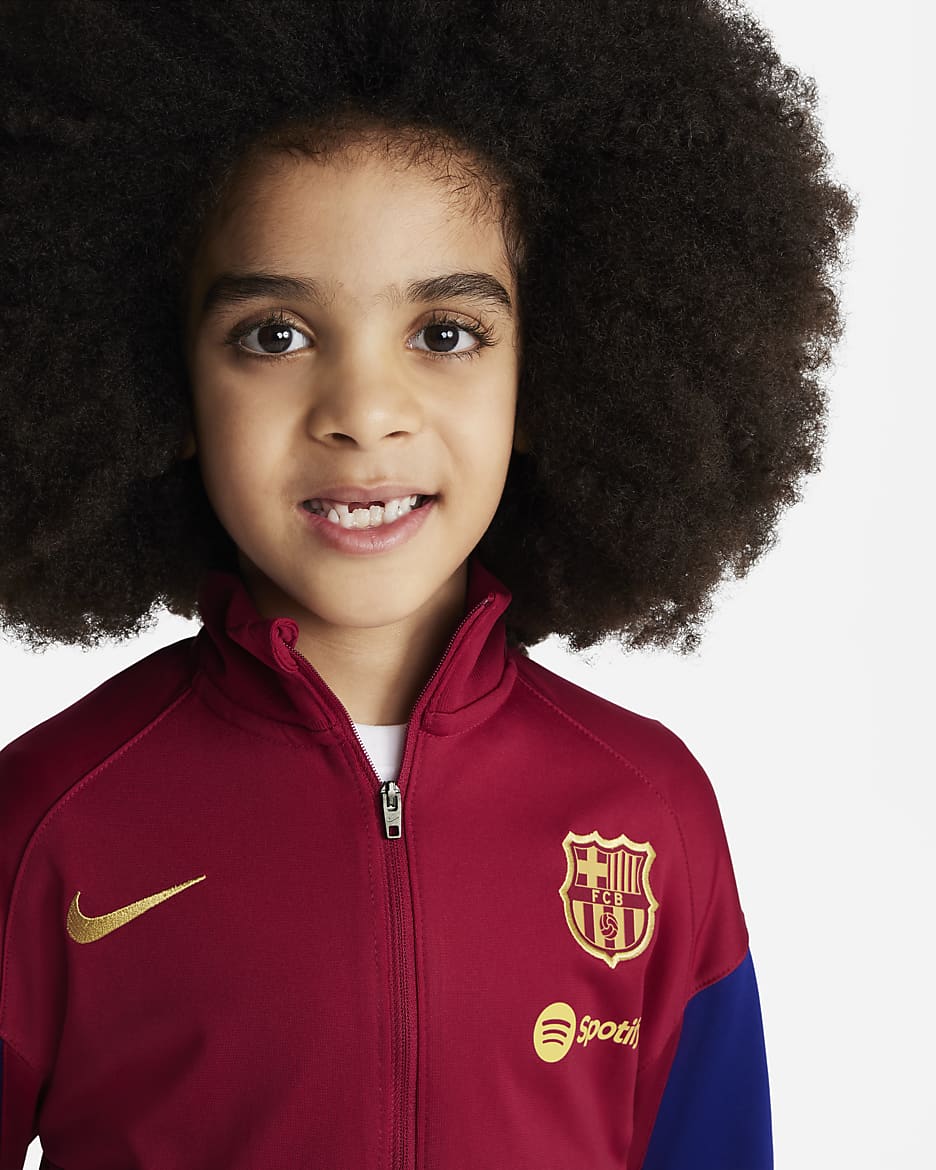 FC Barcelona Strike Nike Dri-FIT strikket fotballtracksuit til små barn - Noble Red/Deep Royal Blue/Obsidian/Club Gold