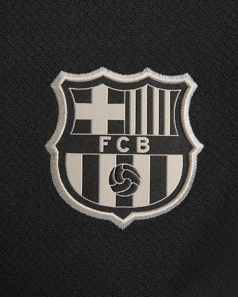 Camisola de futebol de malha de manga curta Nike Dri-FIT Strike FC Barcelona para mulher - Preto/Vermelho Noble/Azul Royal intenso/Castanho Orewood claro