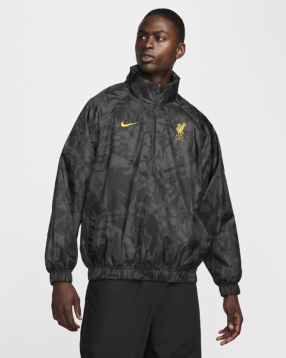 Chamarra de fútbol tipo anorak Nike para hombre Liverpool FC Windrunner alternativa - Gris humo oscuro/Negro/Amarillo cromo