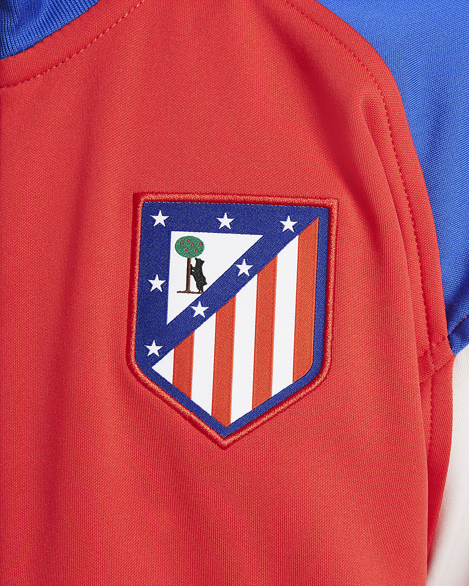 Fotbalová reprezentační bunda Nike Dri-FIT Atlético Madrid Academy Pro pro větší děti - Light Crimson/Hyper Royal/Phantom/Phantom