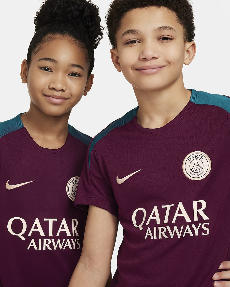 Paris Saint-Germain Strike Nike Dri-FIT knit voetbaltop met korte mouwen voor kids - Bordeaux/Bordeaux/Geode Teal/Guava Ice