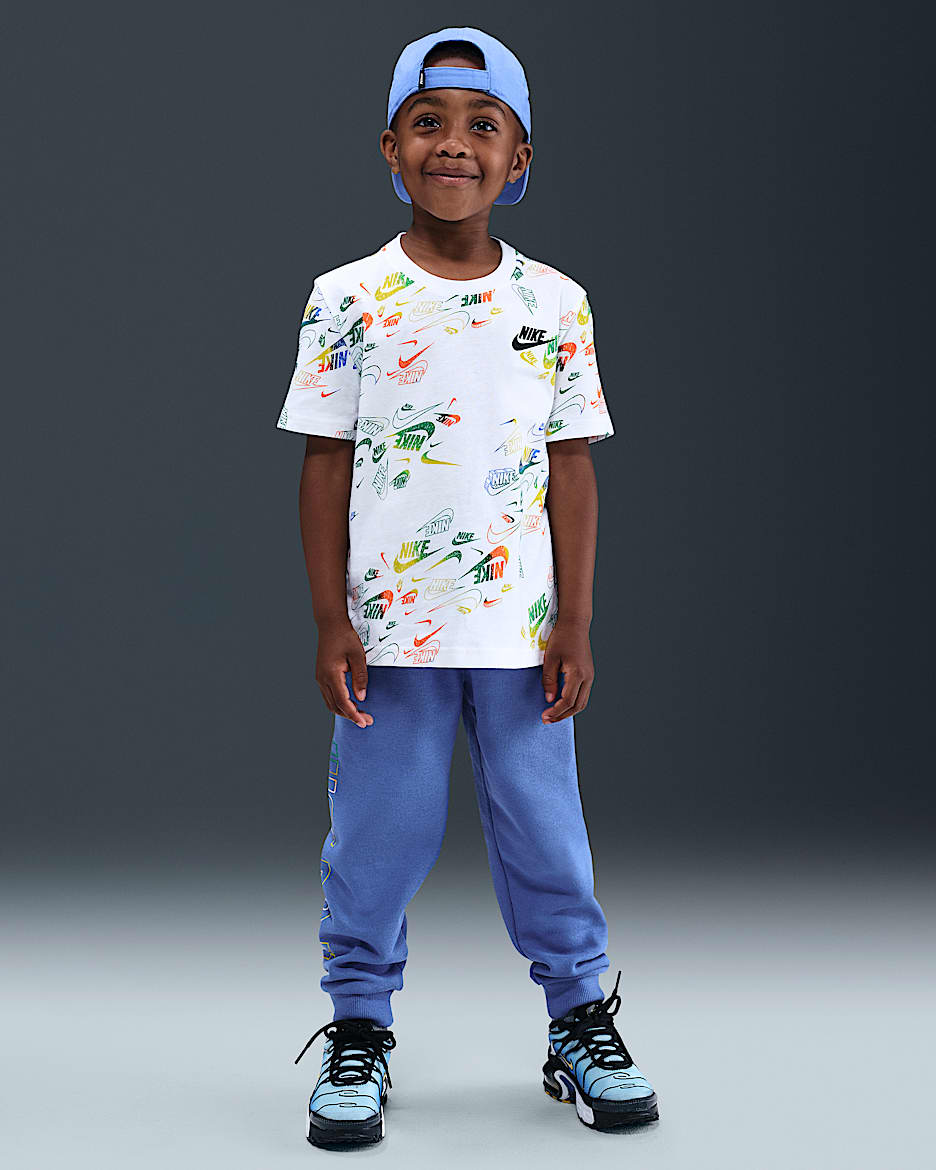 Conjunto de playera y pants Reveal estampado para niños talla pequeña Nike Sportswear - Azul cometa
