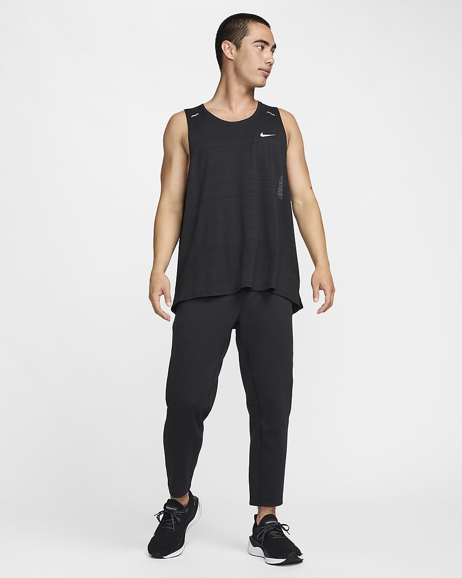 Nike Primary Men's Dri-FIT UV Tapered Versatile Trousers - Black/Black