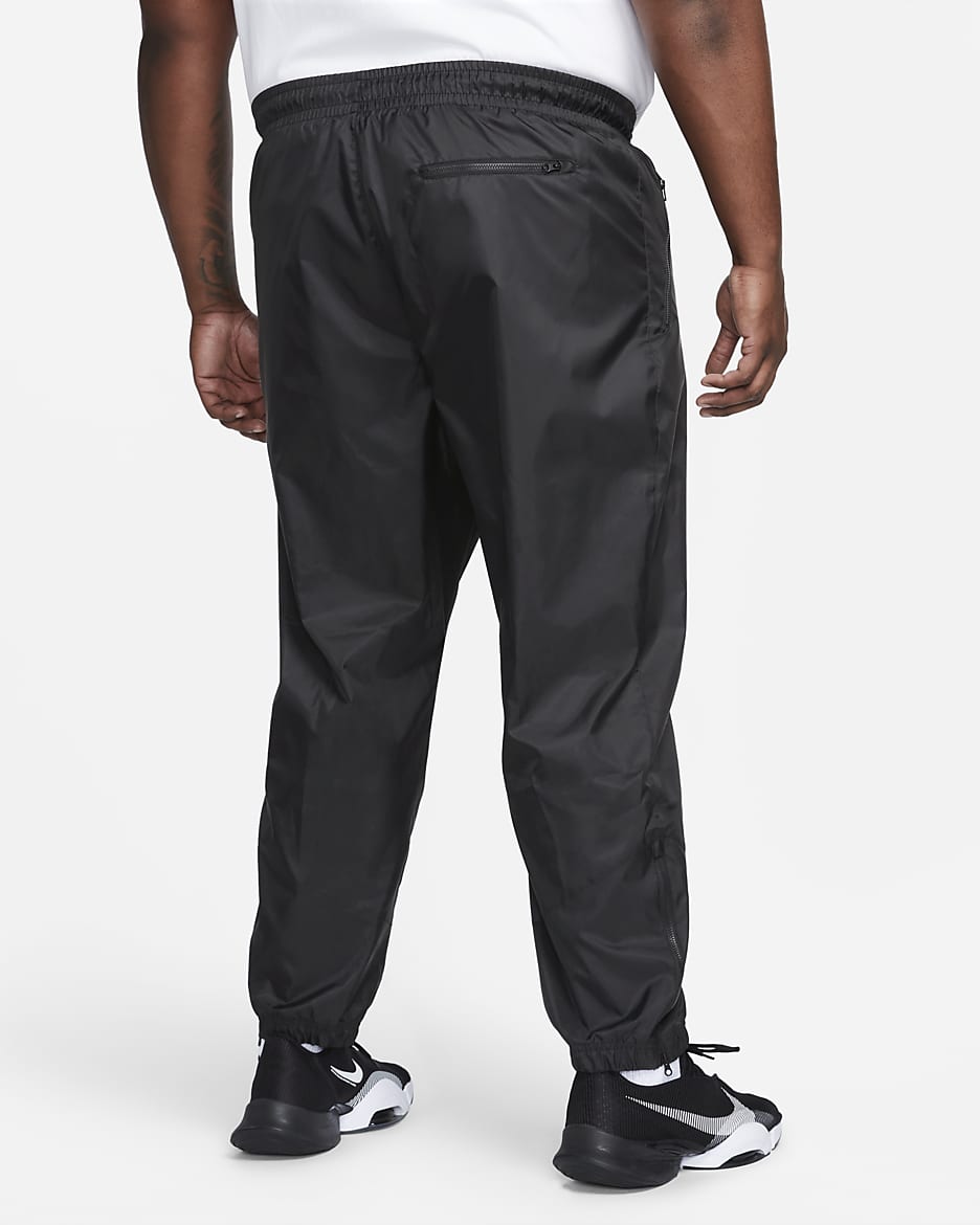 Pants forrados de tejido Woven para hombre Nike Windrunner - Negro/Negro/Blanco