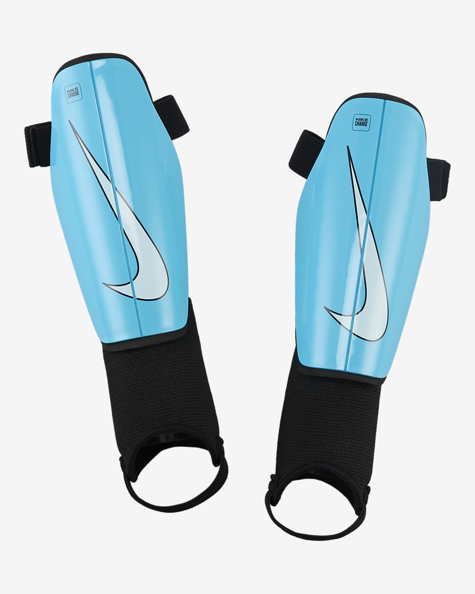 Dziecięce nagolenniki piłkarskie Nike Charge - Blue Fury/Czerń/Glacier Blue