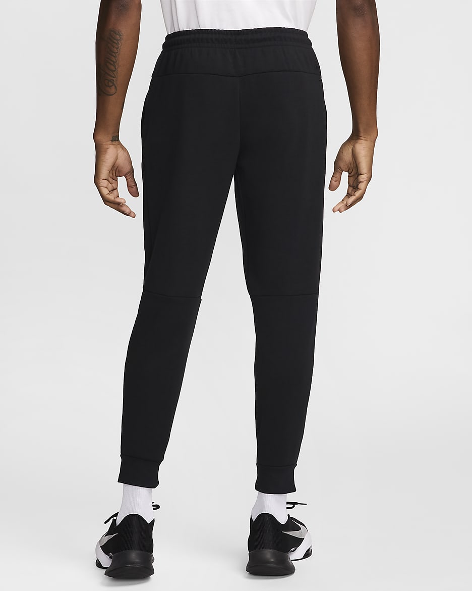 Alsidige Nike Primary Dri-FIT UV-joggers til mænd - sort/sort