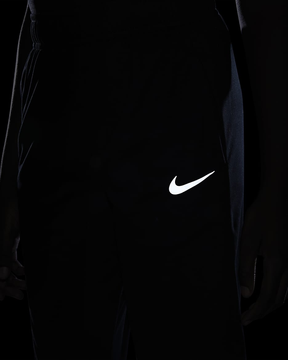 Tréninkové kalhoty Nike Poly+ pro větší děti (chlapce) - Černá