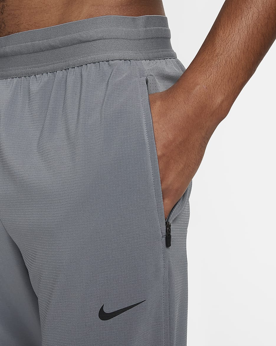 Nike Flex Rep Dri-FIT fitnessbroek voor heren - Smoke Grey/Zwart/Zwart