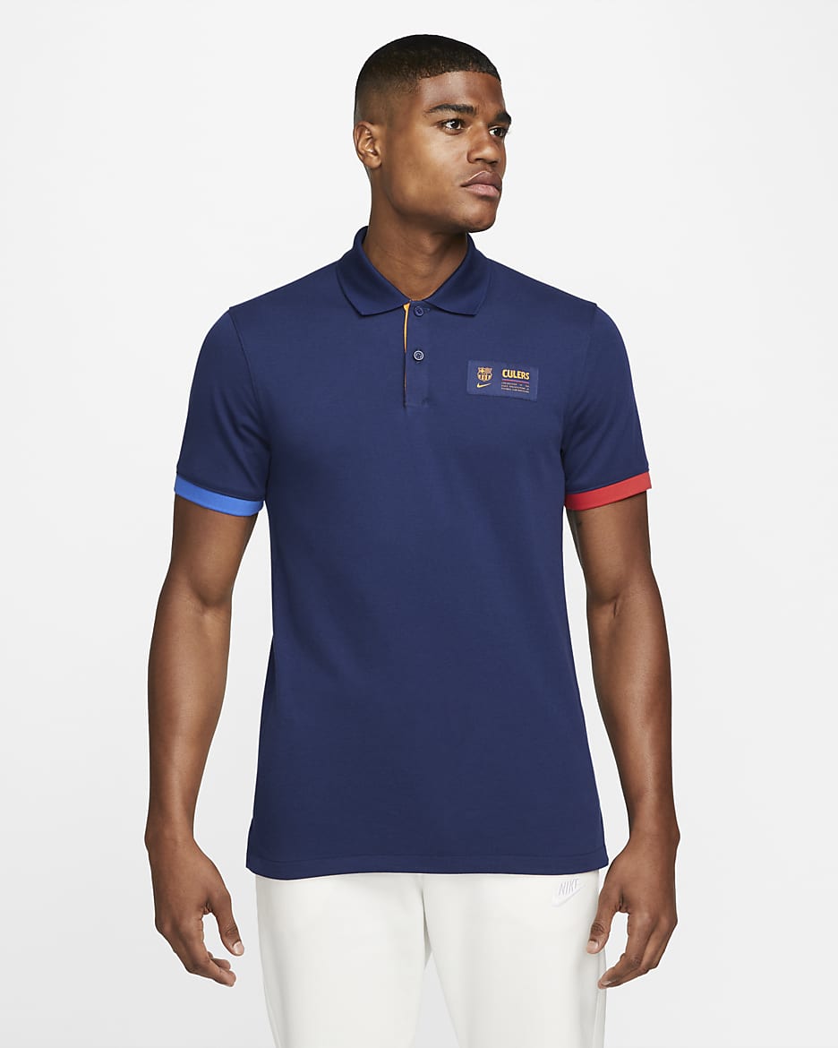 The Nike Polo FC Barcelona Men's Nike Dri-FIT Slim Fit Polo - Blue Void/Game Royal/Vivid Orange/Vivid Orange