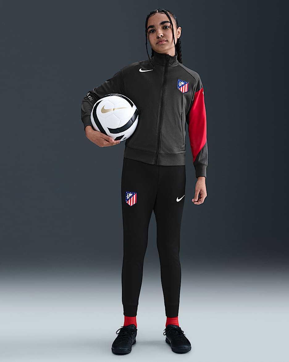 Atlético Madrid Strike Third Nike Dri-FIT Total 90 Fußball-Trainingsanzug aus Strickmaterial (ältere Kinder) - Anthracite/Schwarz/Sport Red/Weiß