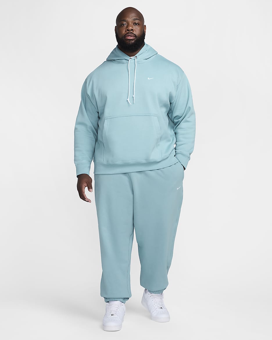 Pantaloni in fleece Nike Solo Swoosh - Uomo - Denim Turquoise/Bianco