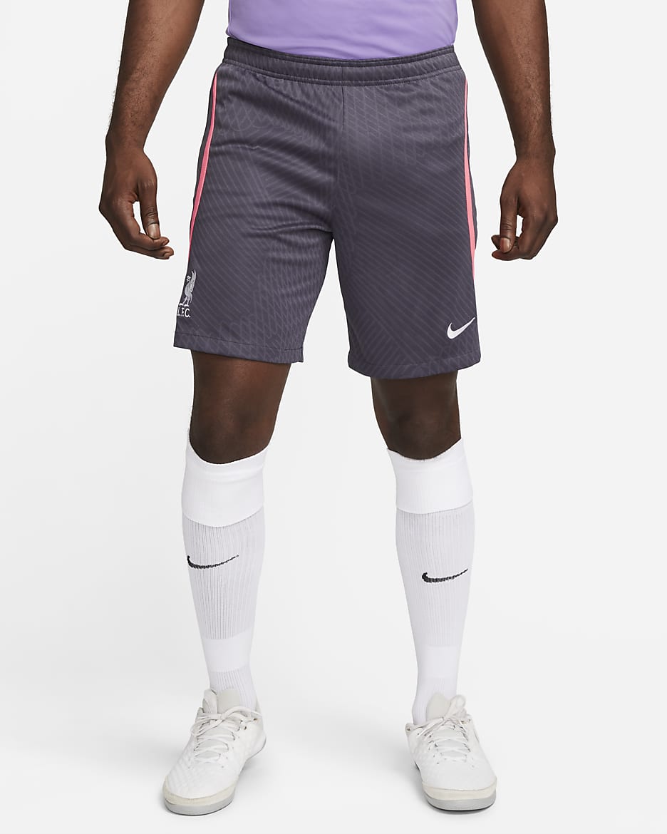 Liverpool FC Strike harmadik Nike Dri-FIT kötött férfi futballrövidnadrág - Gridiron/Hot Punch/Fehér