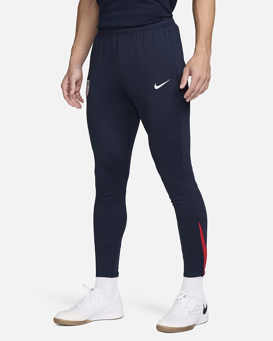 Pants de fútbol de tejido Knit Nike Dri-FIT de la selección nacional masculina de Estados Unidos Strike para hombre - Obsidiana/Rojo deportivo/Blanco