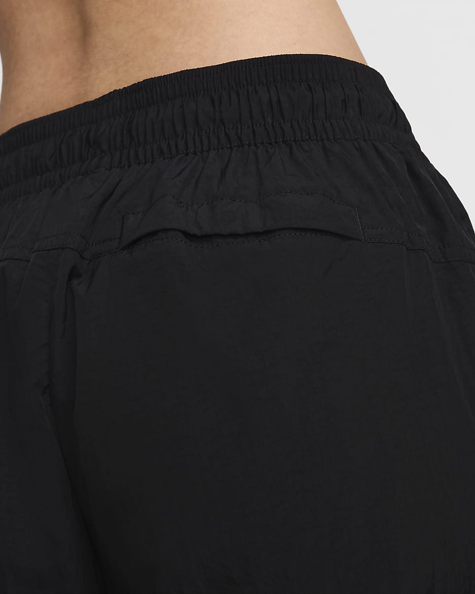 Pantalon à zip taille mi-haute déperlant Nike Sportswear Collection pour femme - Noir/Blanc