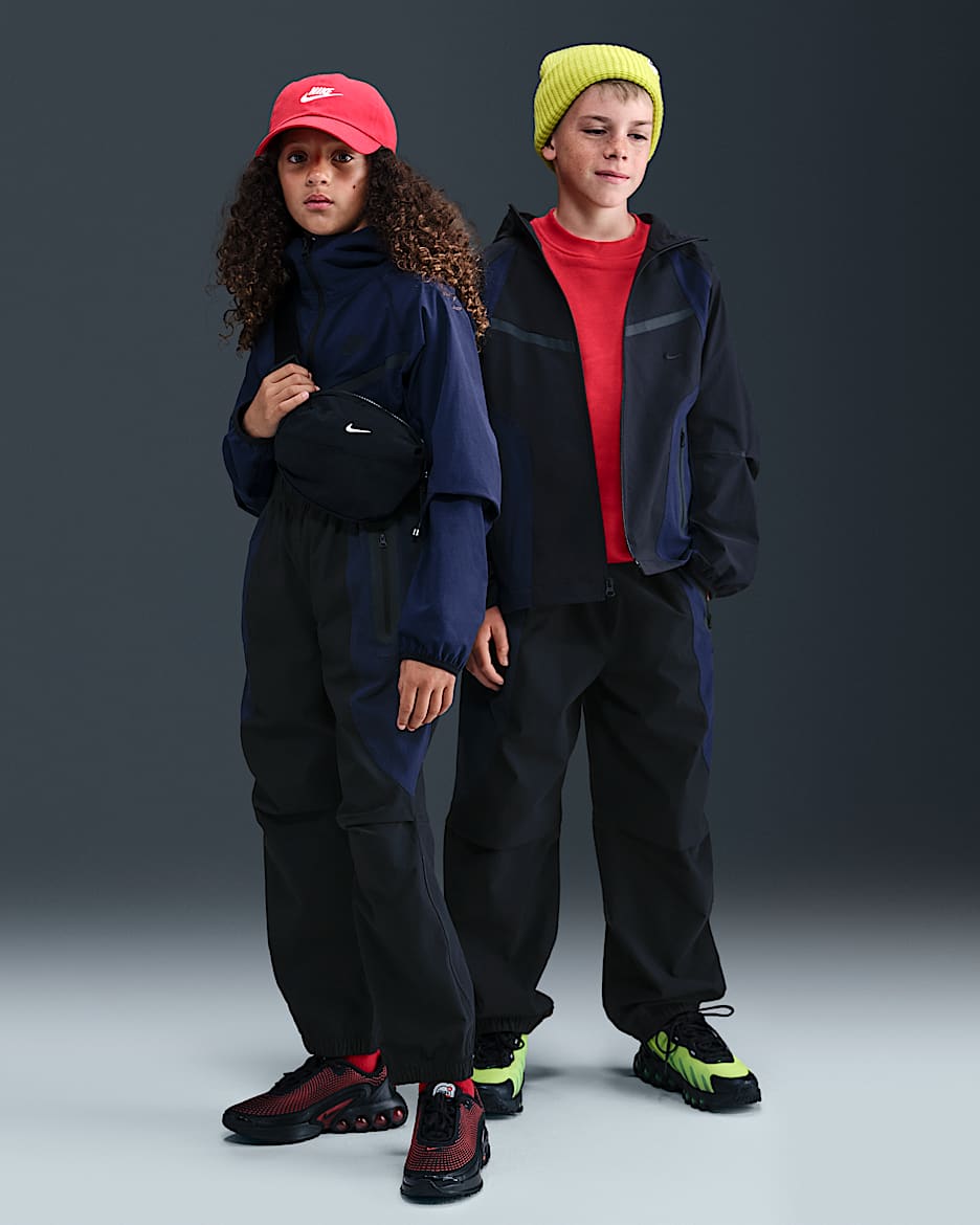 Vævede Nike Tech-bukser til større børn (drenge) - sort/Obsidian/sort