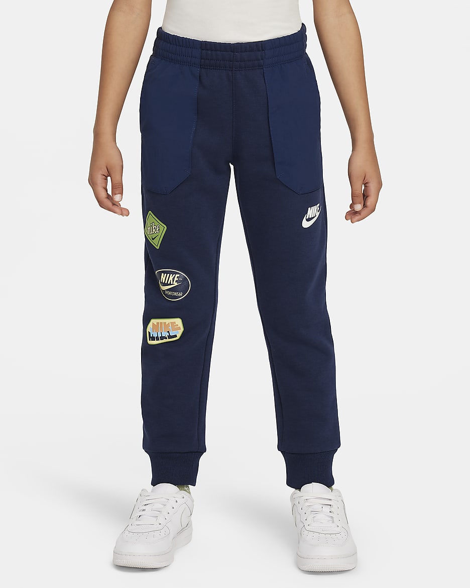 Pantalones de entrenamiento de tejido Fleece para niños talla pequeña Nike Sportswear
 - Azul marino medianoche