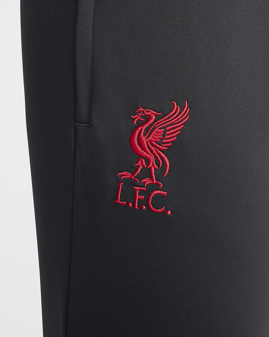 Męskie spodnie piłkarskie Nike Dri-FIT Liverpool F.C. Strike (wersja trzecia) - Dark Smoke Grey/Chrome Yellow/Global Red