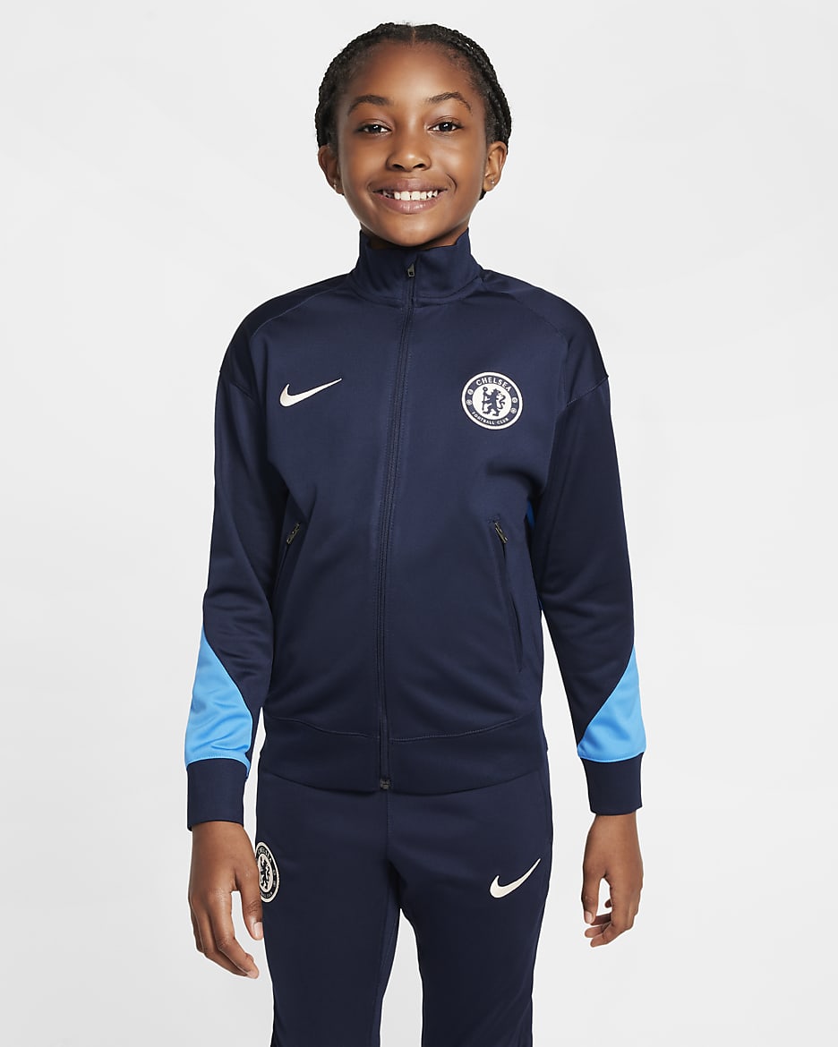 Chelsea F.C. Strike Older Kids' Nike Dri-FIT Football Knit Tracksuit - Obsidian/Light Photo Blue/Guava Ice