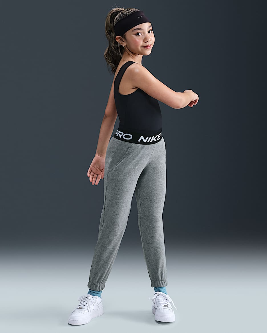 Nike Pro Fleece Older Kids' (Girls') Dri-FIT Joggers - Carbon Heather/Dark Steel Grey/Black/White