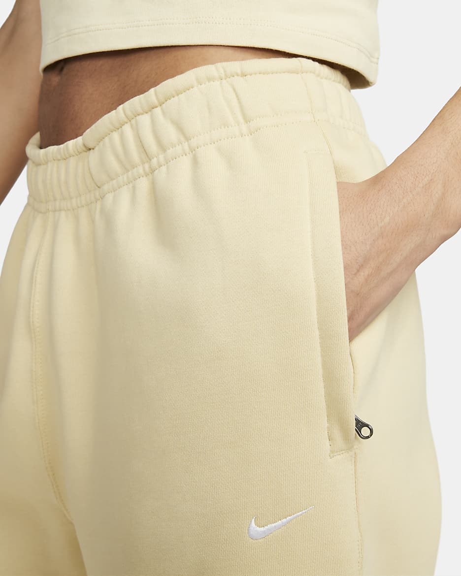 Pantaloni in fleece Nike Solo Swoosh - Donna - Team Gold/Bianco