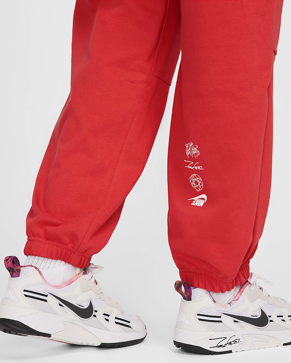 Pants de French Terry oversized de tiro medio para mujer Nike Sportswear Breaking - Carmesí claro