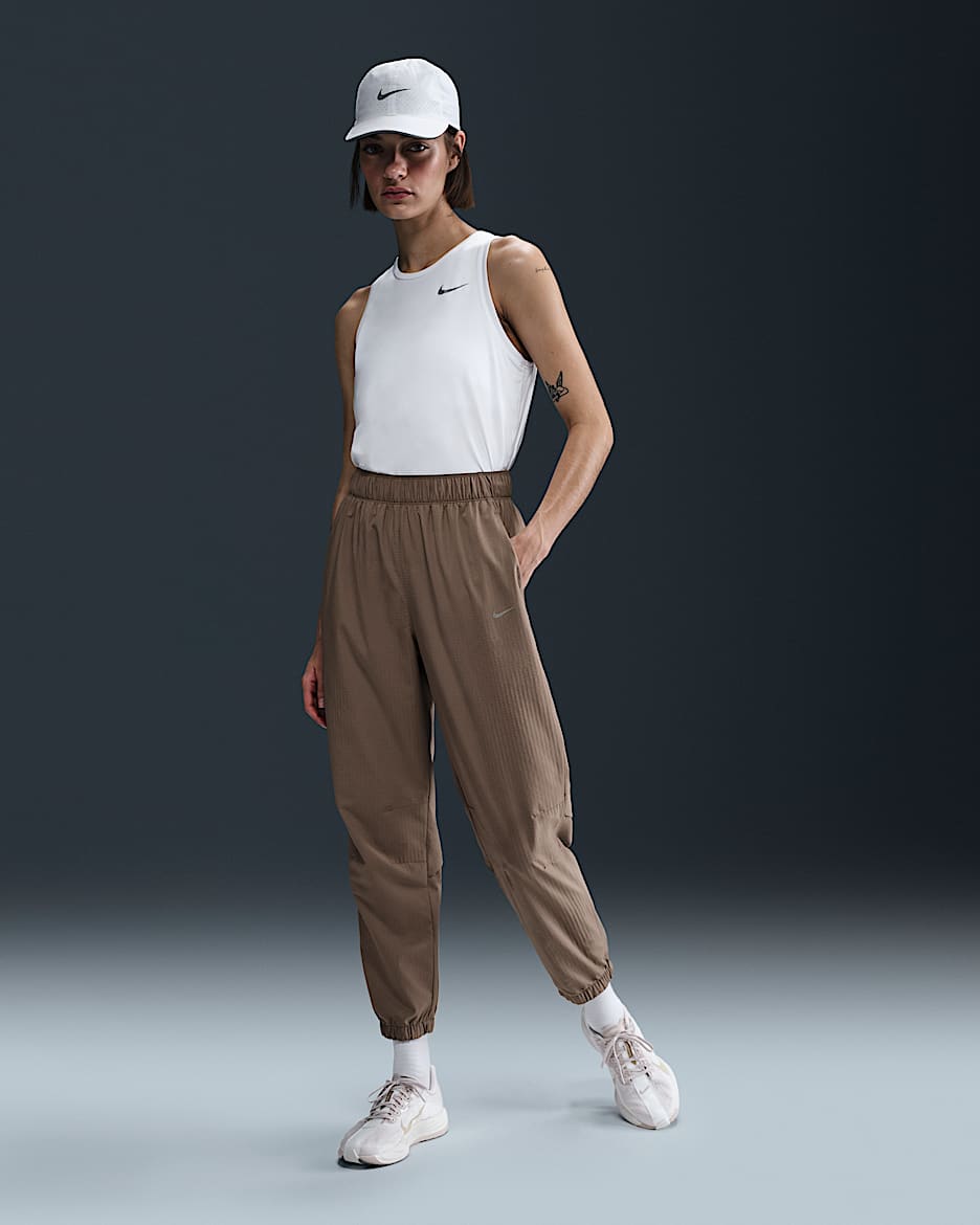 Pantalon de running d'échauffement 7/8 taille mi-haute Nike Dri-FIT Fast pour femme - Mink Brown