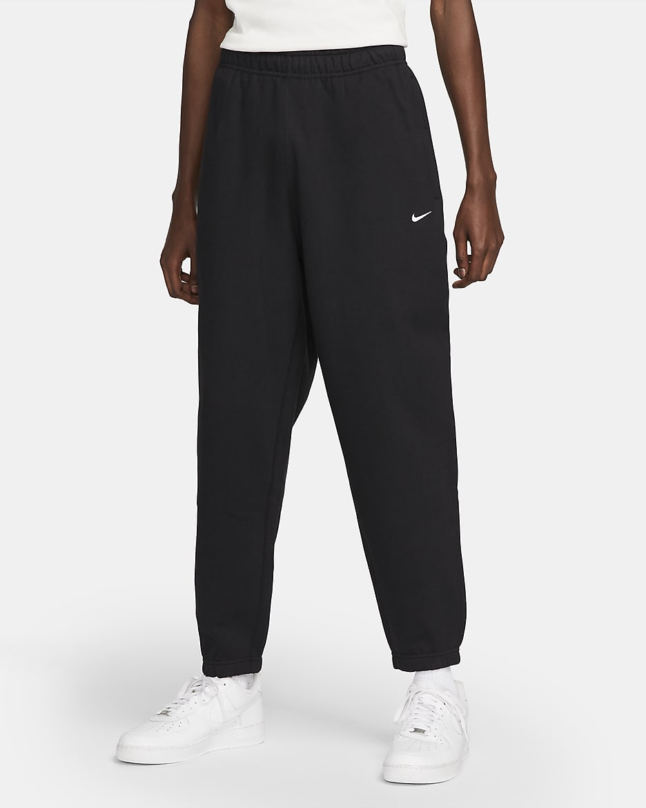 Pantalon en tissu Fleece Nike Solo Swoosh pour Homme - Noir/Blanc